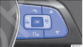 Fig. 16 Lado direito do volante multifunções: teclas de comando.